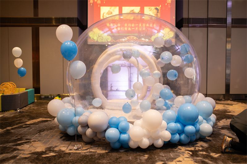 Clear bubble house with balloons